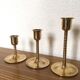 Series of 7 Scandinavian brass candlesticks