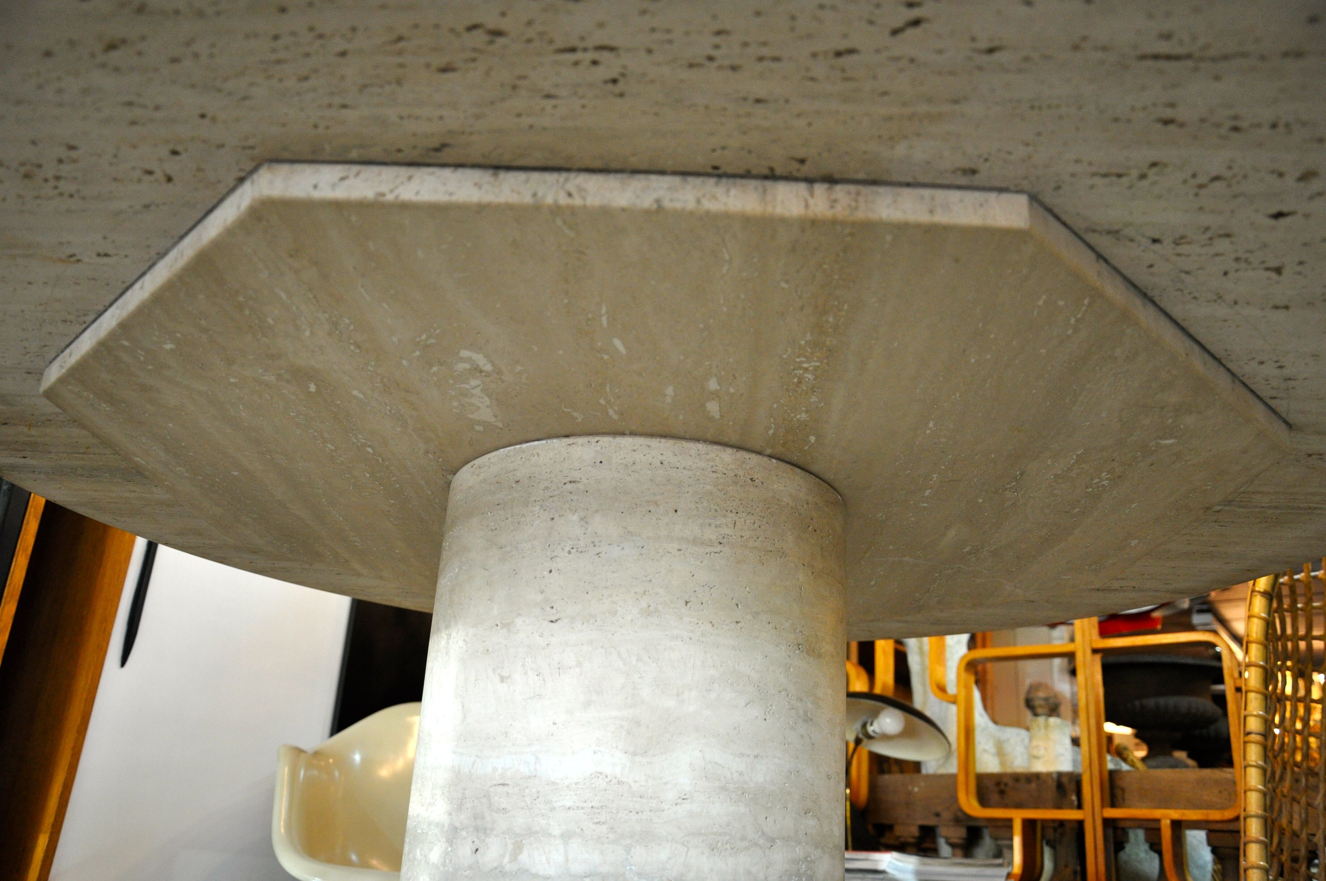 Round travertine table