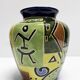 Glazed ceramic vase with Africanist decoration, France 1980s.