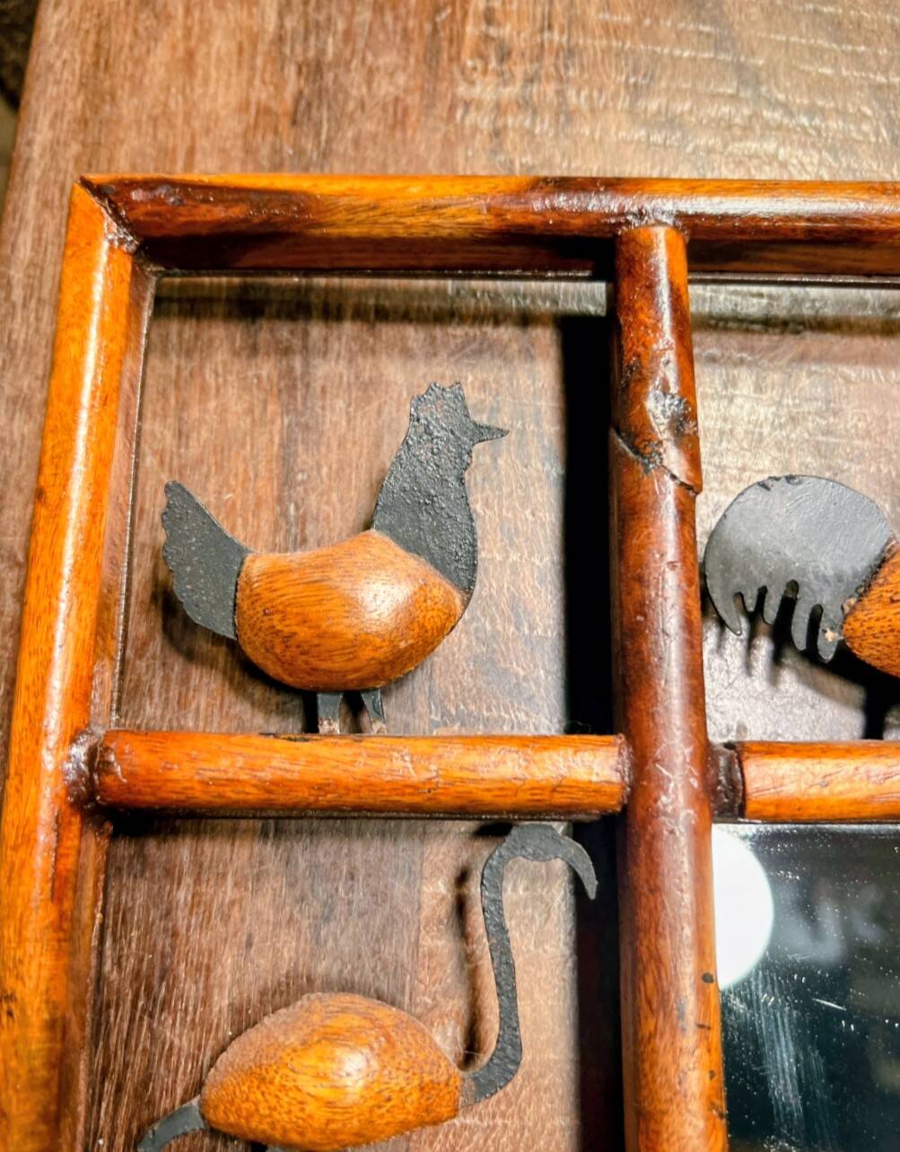 Wrought iron wood animal mirror