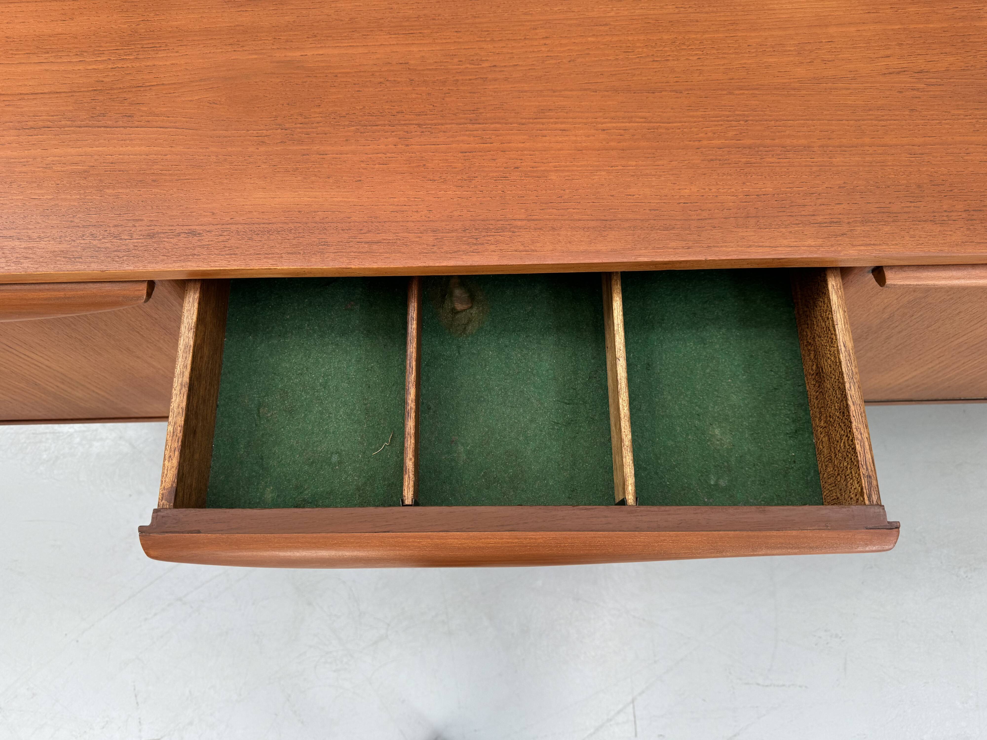 Beautiful and unique Stonehill sideboard from the 1960s made of teak wood.