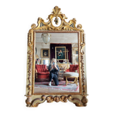 Italian mirror from the Napoleon III period in painted and gilded wood