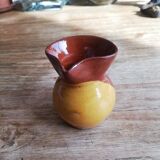 Small two-tone brown-yellow terracotta pitcher