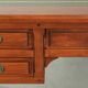 Elegant English style desk with green leather top, gold details and drawers