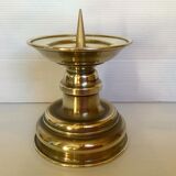 Old brass candle pique