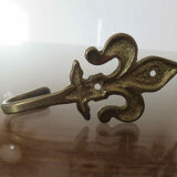 Brass "fleur de lys" hook 30-40s
