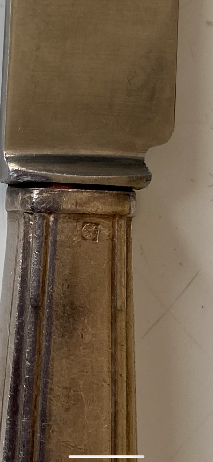 Box of silver metal knives