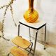 Retractable foot step ladder