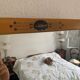 Miroir vintage 1930  biseauté octogonal bois stuc - 66 x 45 cm