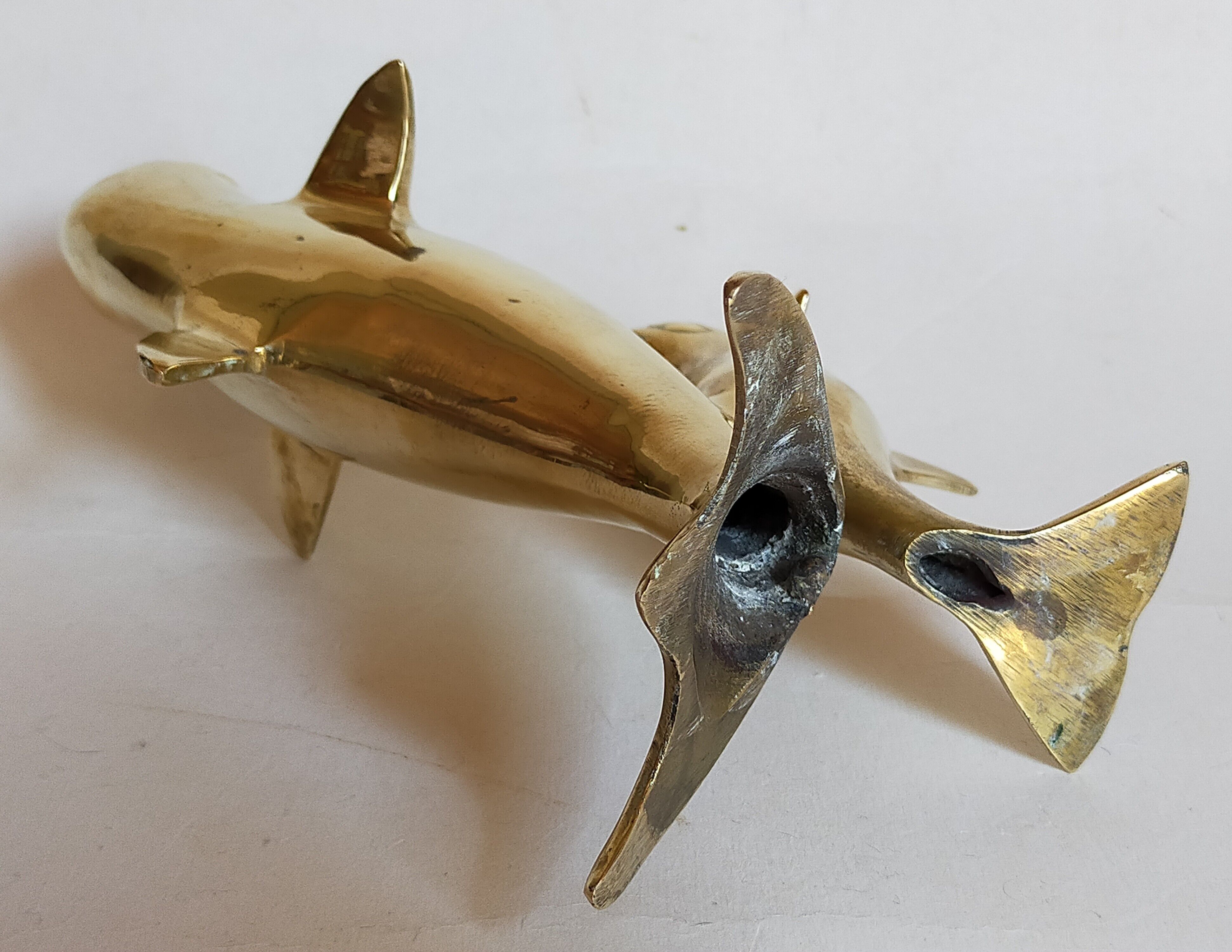 Vintage solid brass dolphins