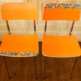 Pair of orange Formica "Tublac" chairs
