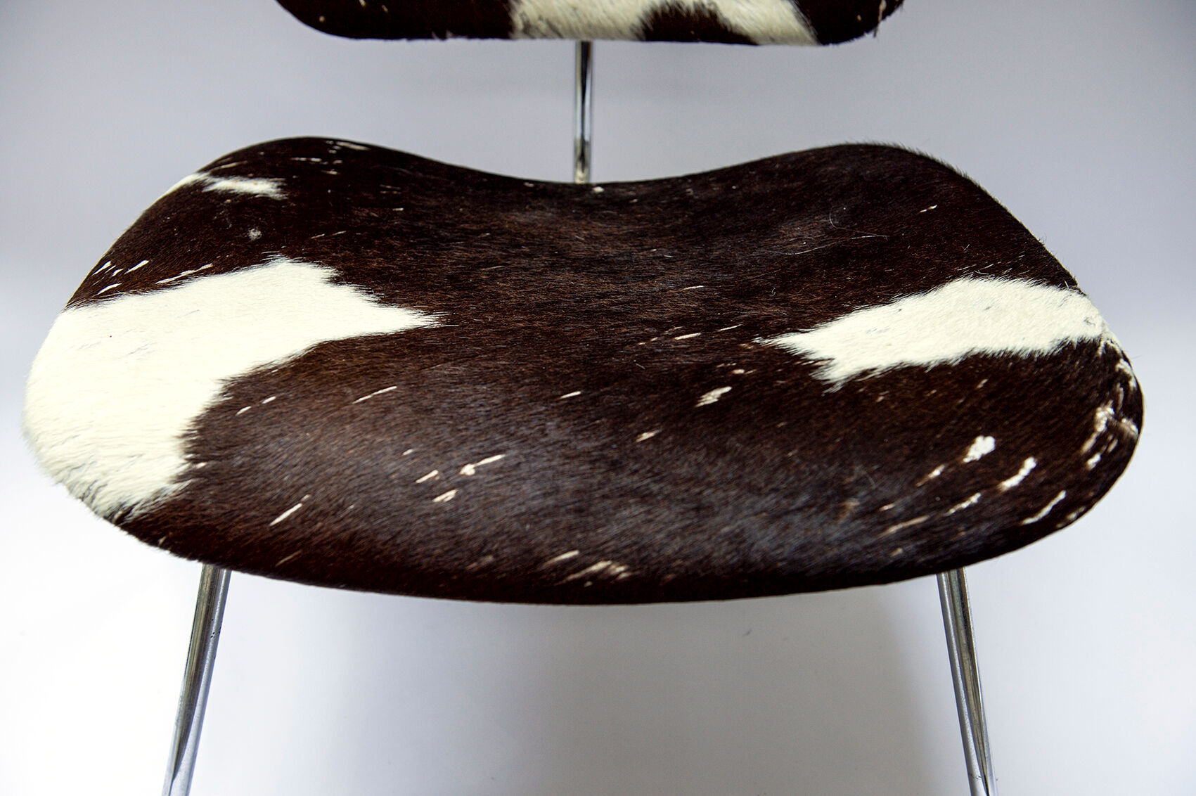 Lounge chair by Charles and Ray Eames "LCM" calfs skin