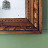 Ancient mirror in carved wood and mercury  48x63cm