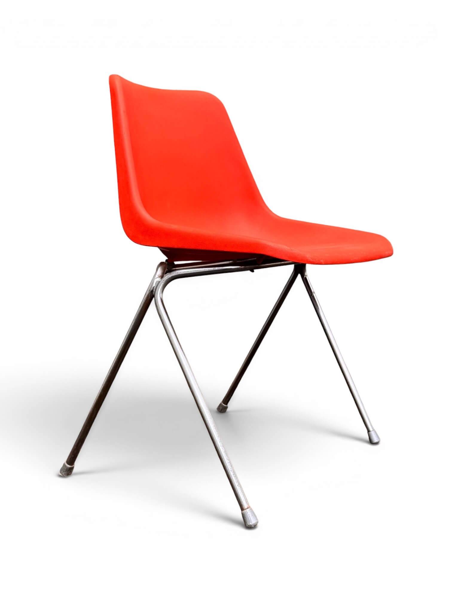 Set of 4 orange chairs designed by Robin Day for Hille.
