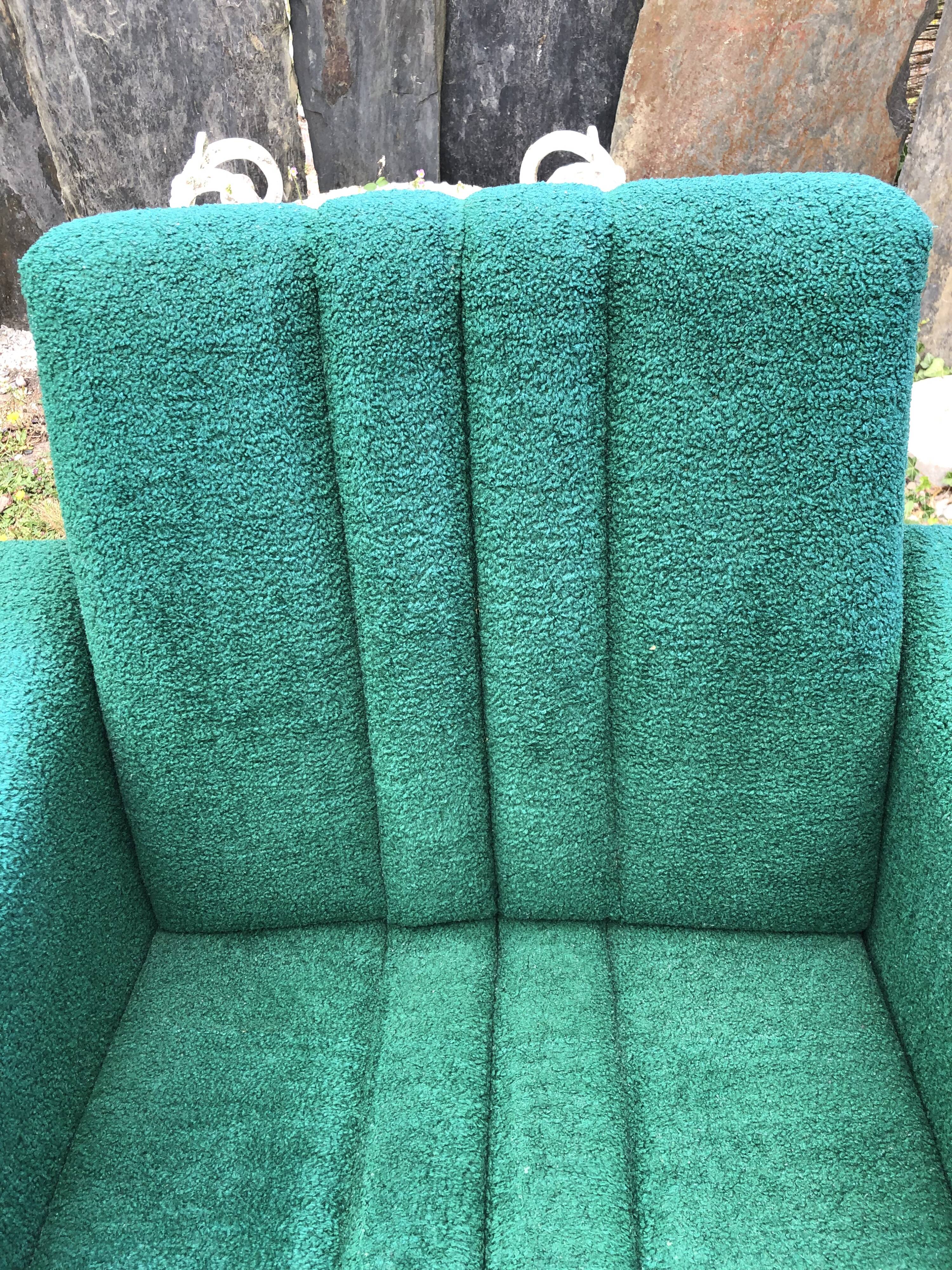 Duo of vintage armchairs with green fabrics.