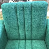 Duo of vintage armchairs with green fabrics.