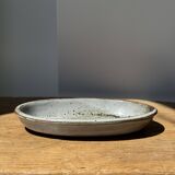 Petit plat ovale en céramique mouchetée glacée L23