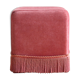 Pouf en velours rose à franges