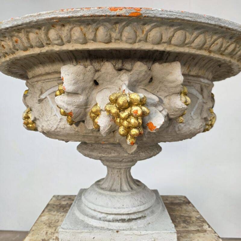 Large pair of 19th-century cast iron basins with vine decoration.