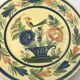 Assiette ancienne en faïence hb henriot quimper décor de panier floral et oiseau