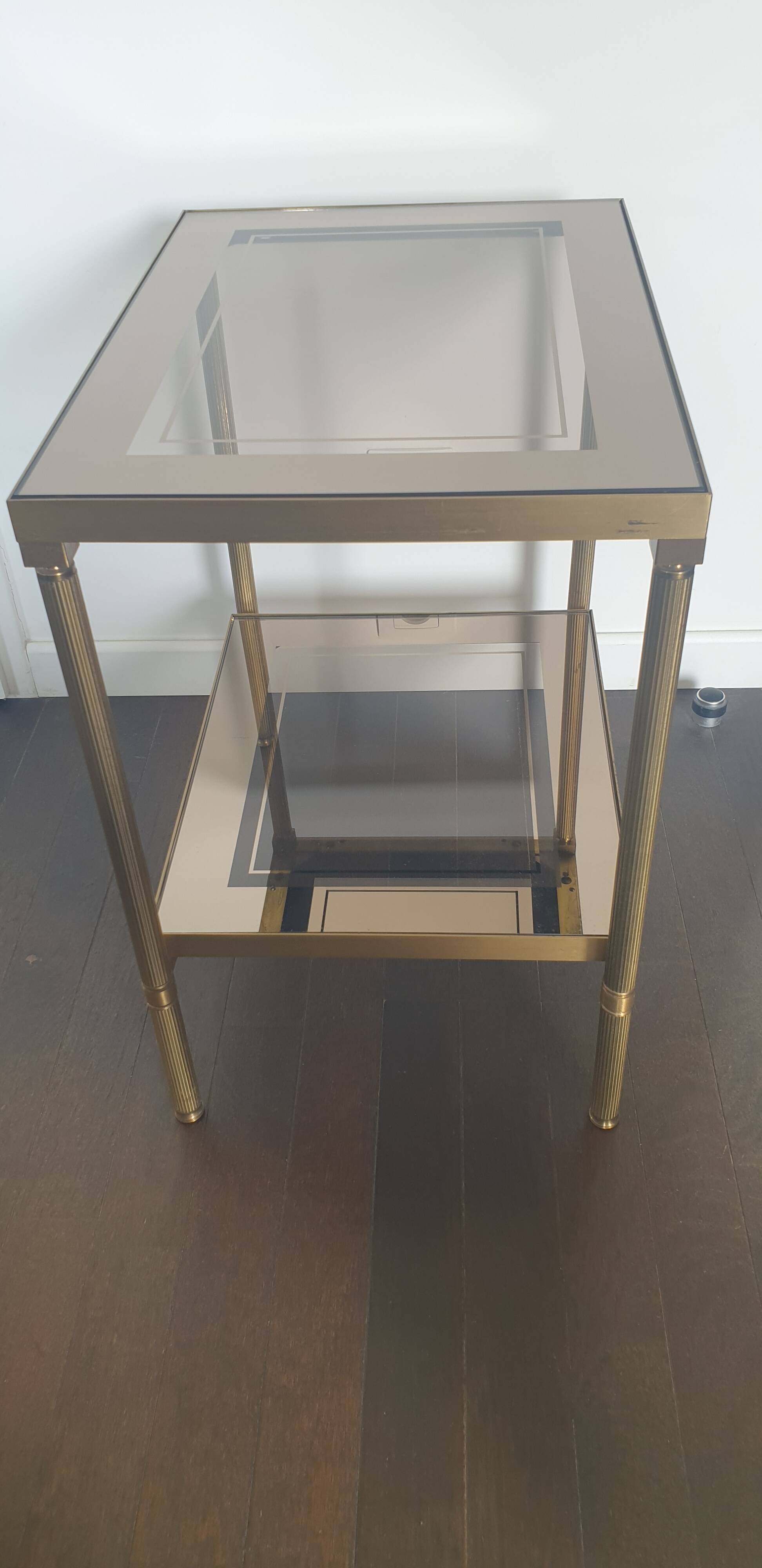 Double tray side table in brass and smoked glass.