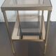 Double tray side table in brass and smoked glass.