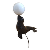 Vintage black sea lion lamp