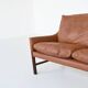 Canapé scandinave trois places en palissandre et cuir marron Danemark 1960