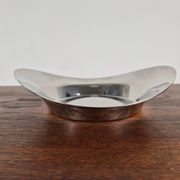 Small circular plate in polished steel by Finn Juhl, Denmark, 1950.