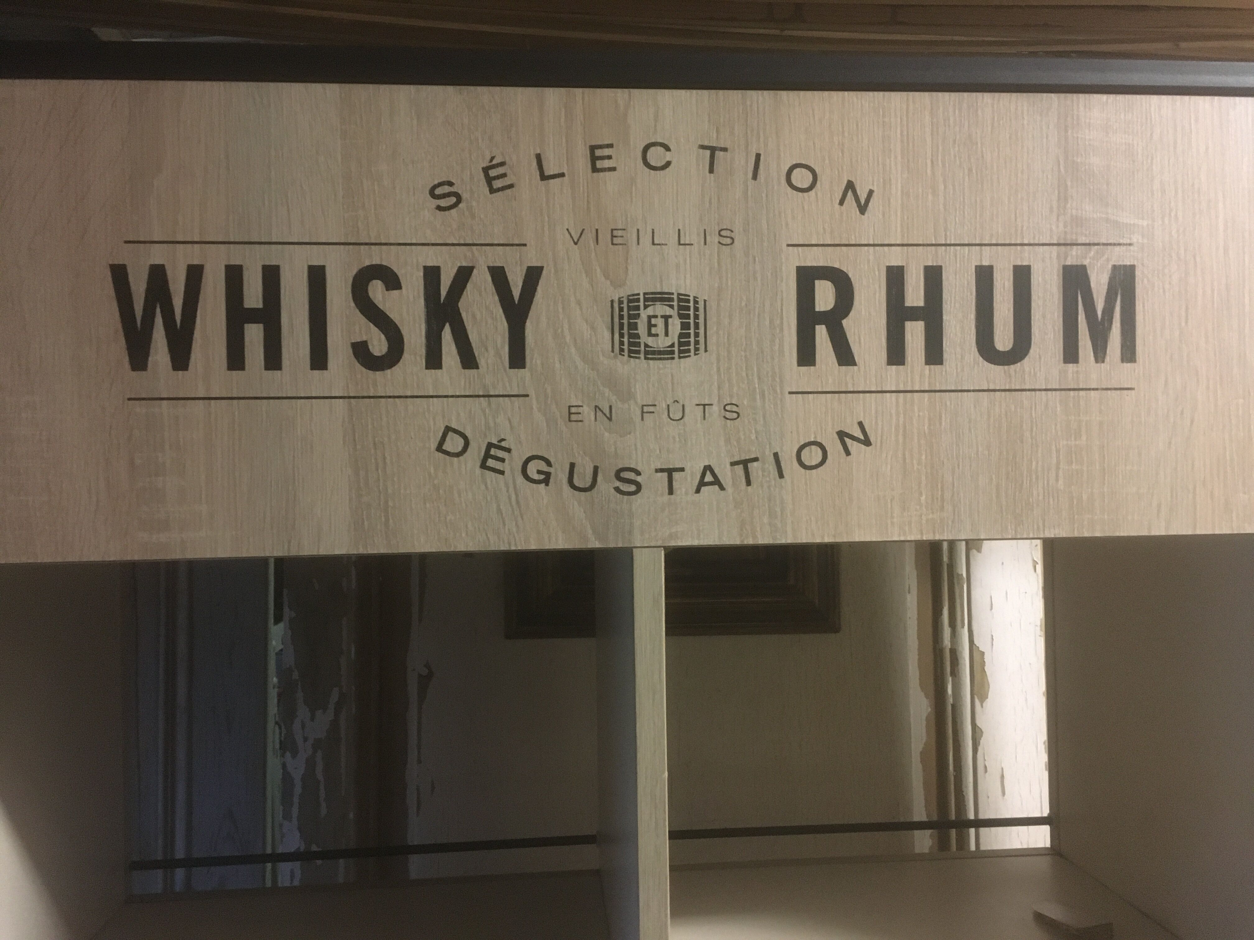Store display for whisky and rum in metal and melamine