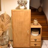 Asymmetrical cabinet made of raw wood