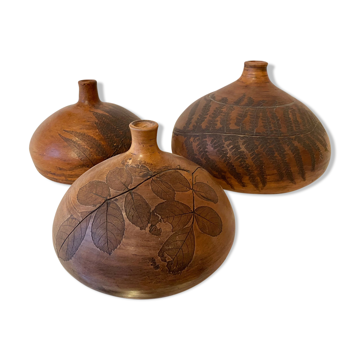 Terracotta vases with plant print