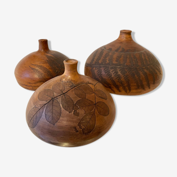 Terracotta vases with plant print