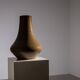 Minimalist curved stoneware vase in matte sand finish