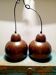 Set of 2 metal pendant lights in copper colour.