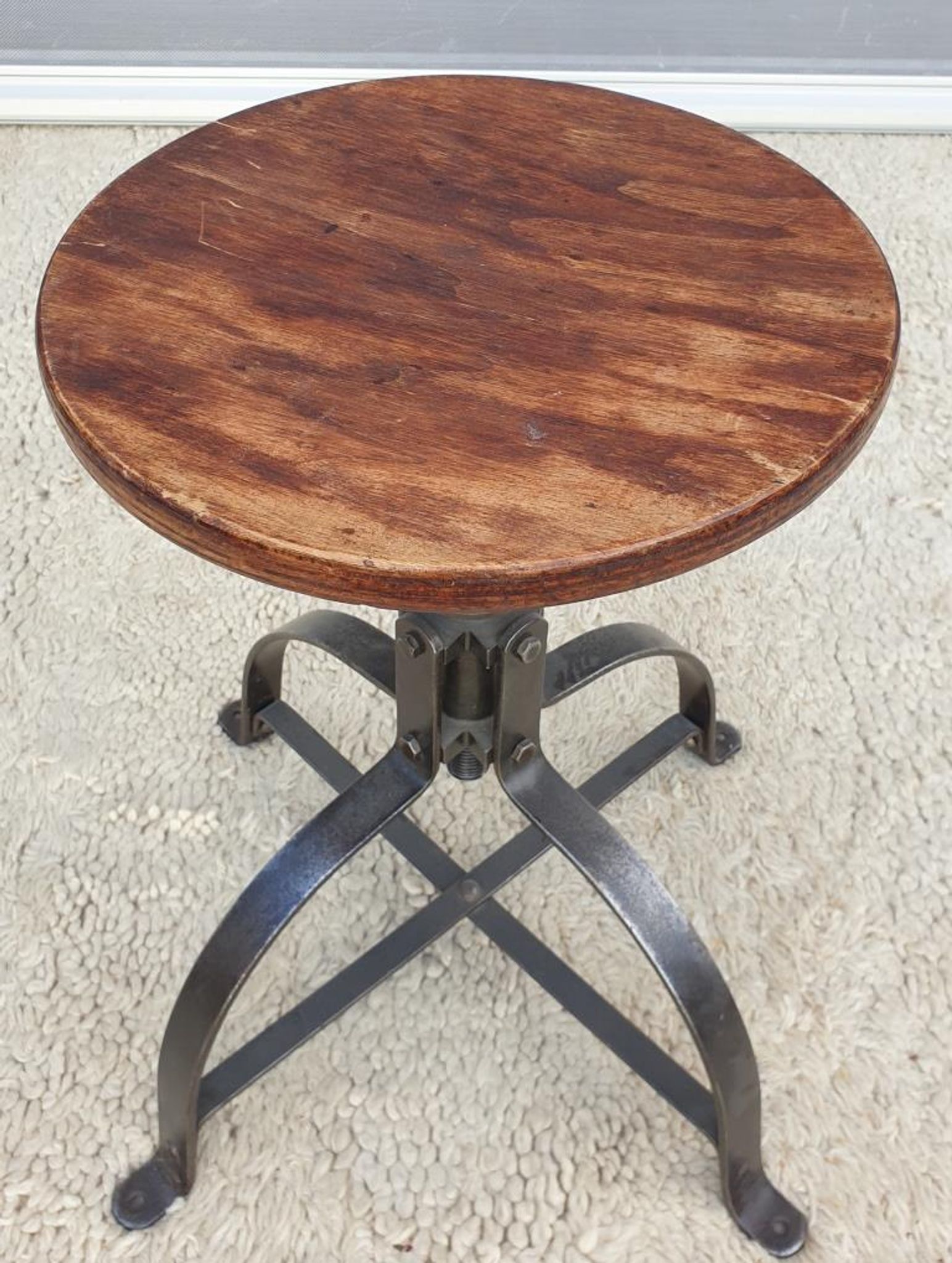 Bienaise stool of the years 1935, model 203 with 4 flat iron cathedral legs joined by a
