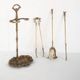 Antique bronze fire screen and fireplace accessories set. Game of seven. France, 1930s