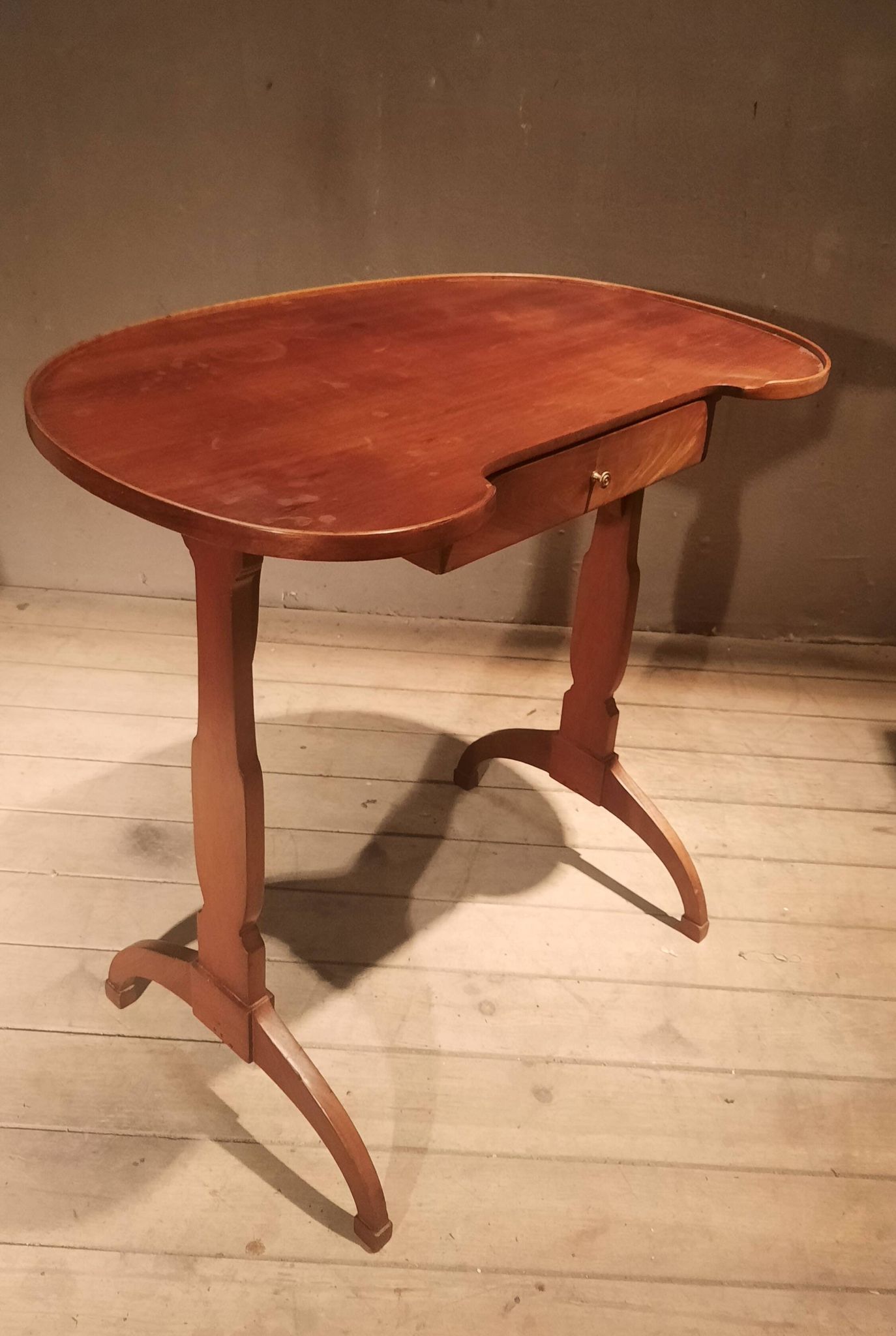 Kidney-shaped side table