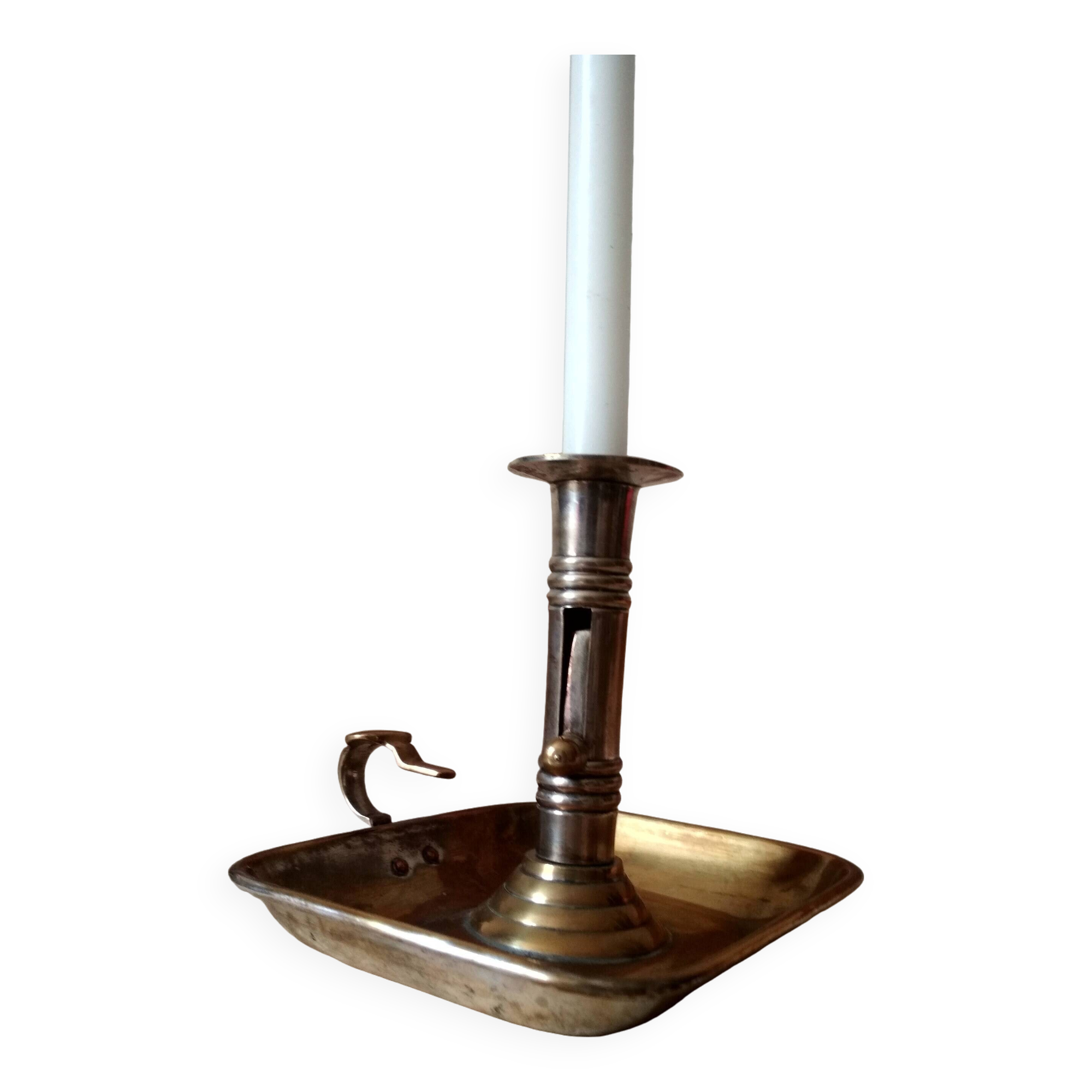 Antique metal and brass hand candle holder on rectangular base