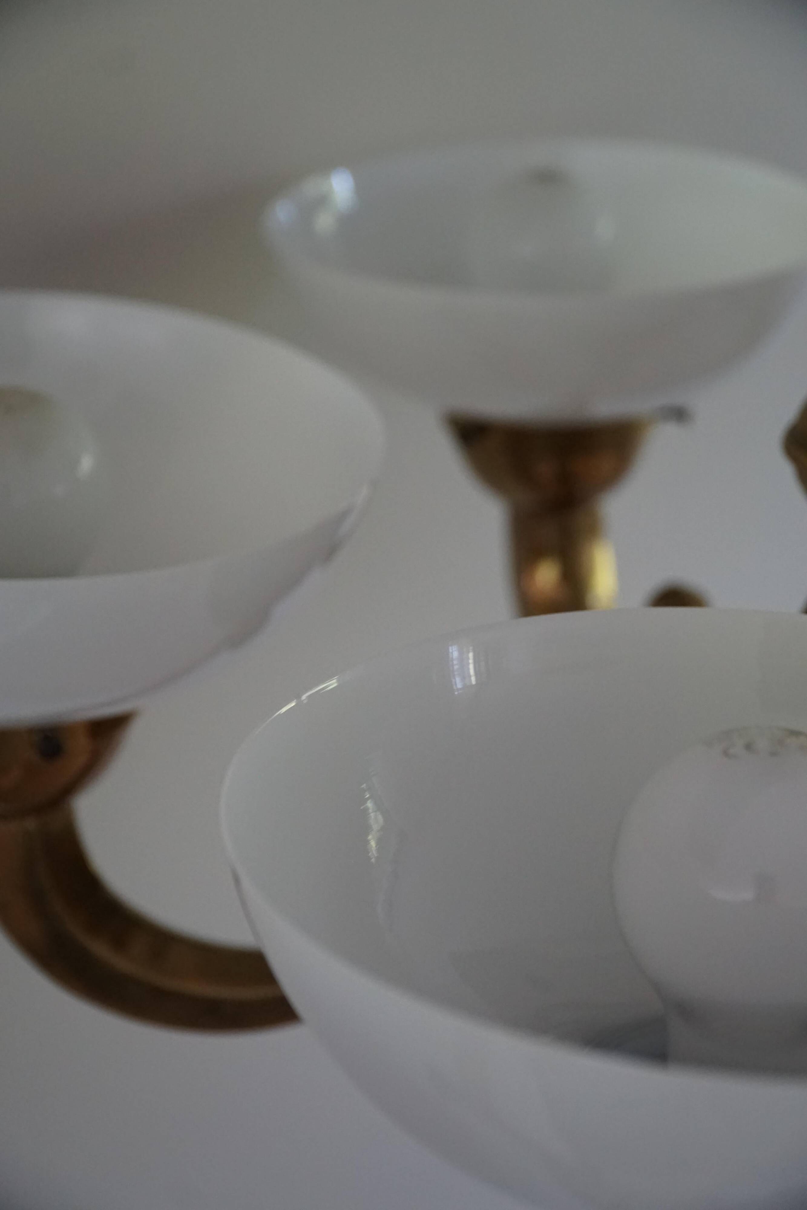 A modern Danish Art Deco chandelier, glass and brass, 1940s.