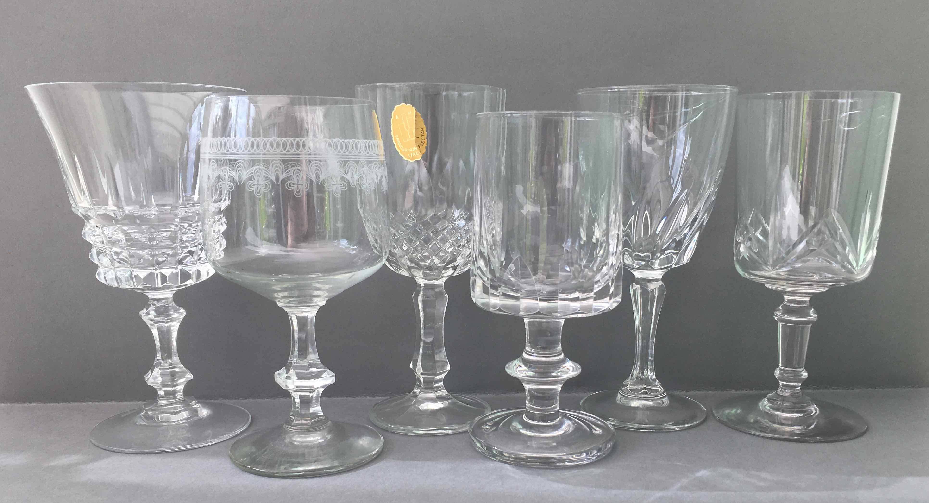 6 assorted crystal wine glasses