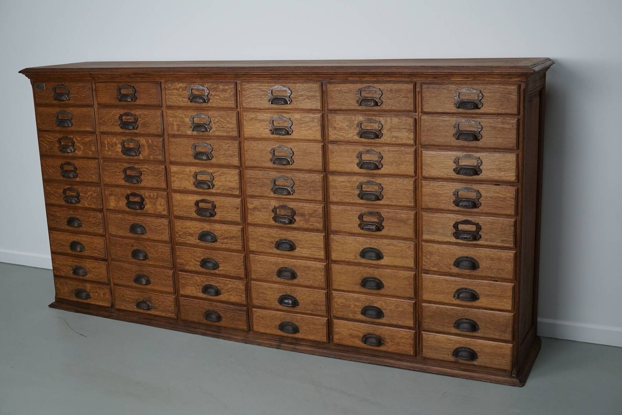 Antique French oak filing / apothecary cabinet by Chouanard, ca 1910