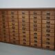 Antique French oak filing / apothecary cabinet by Chouanard, ca 1910
