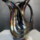 Iridescent ceramic pitcher from Bassano, Italy, from the 1970s.