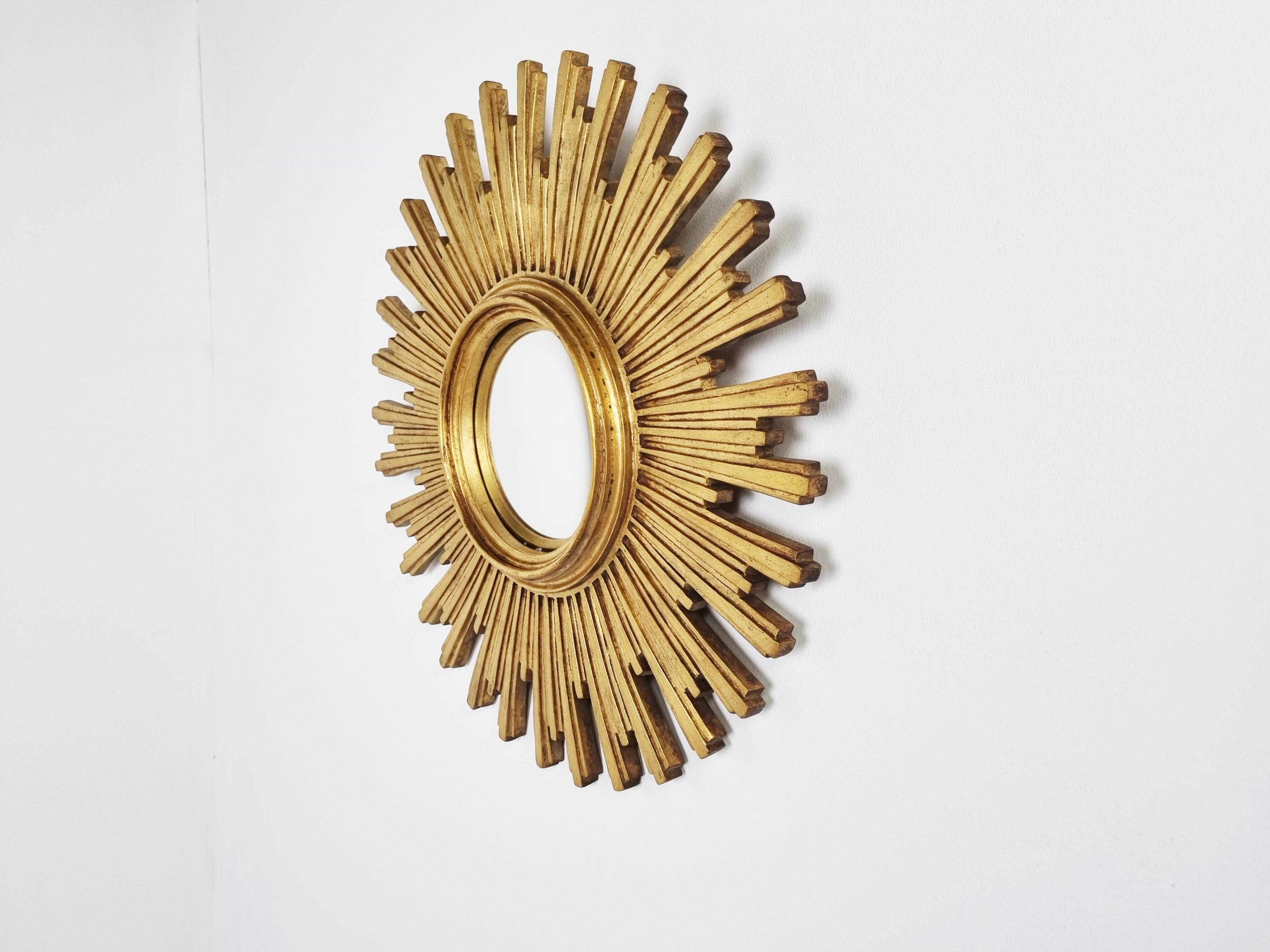 Vintage golden sunburst mirror