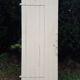 Old door in cream lacquered wood