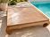 Grande table basse Opium en teck massif cérusé 155 x 155 cm