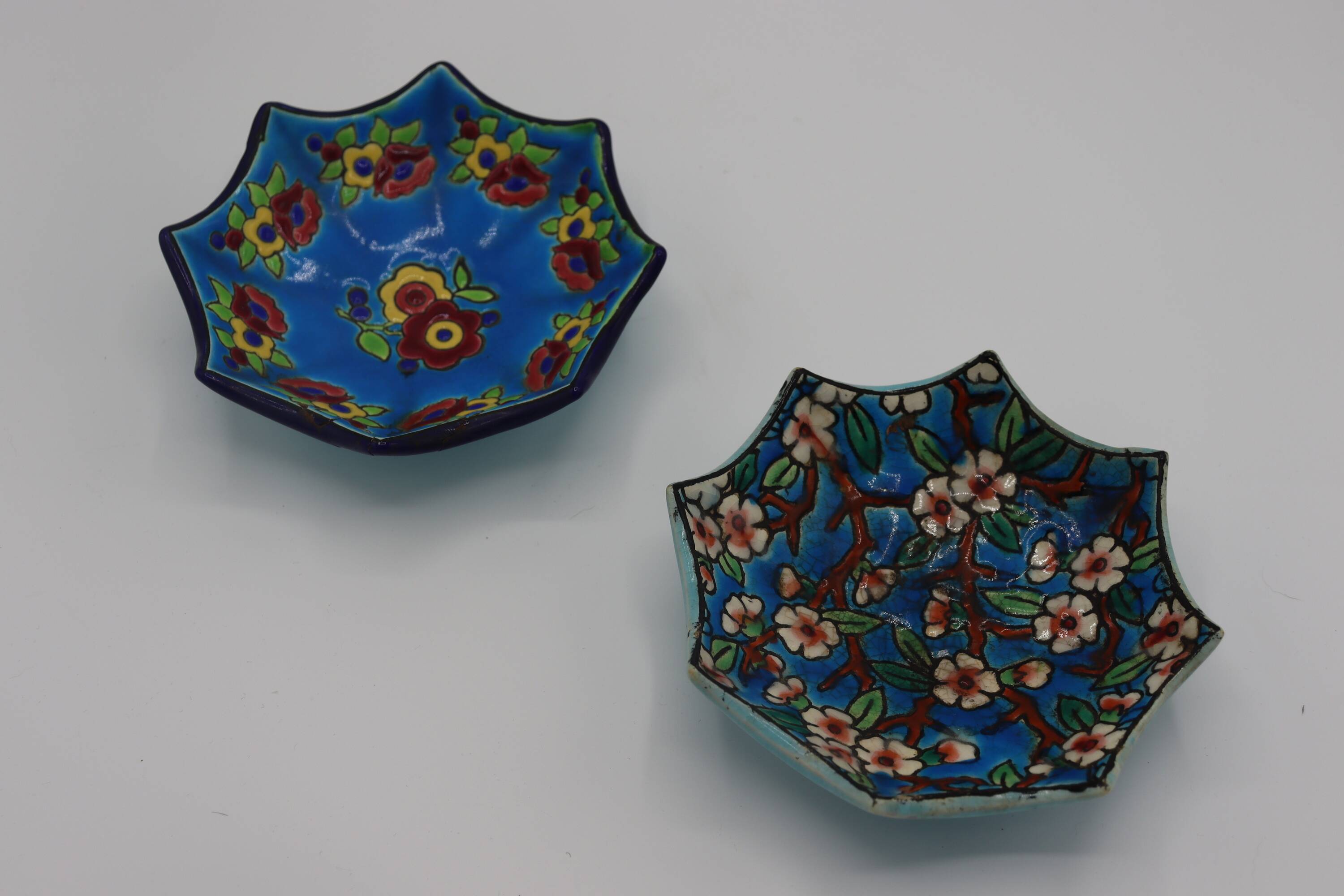 Duo of Longwy enamel saucers