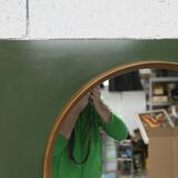 Unusual round wall mirror 60 cm teak edge on green rectangular board 1960.
