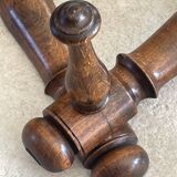 Wall-mounted accordion coat rack made of turned wood